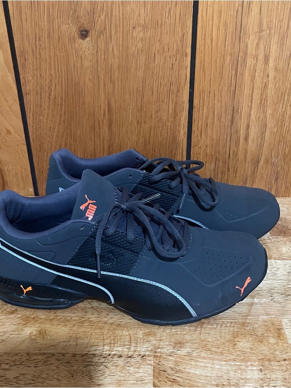 Puma Men’s Black Sneakers with Orange Logos and Light Blue Trim